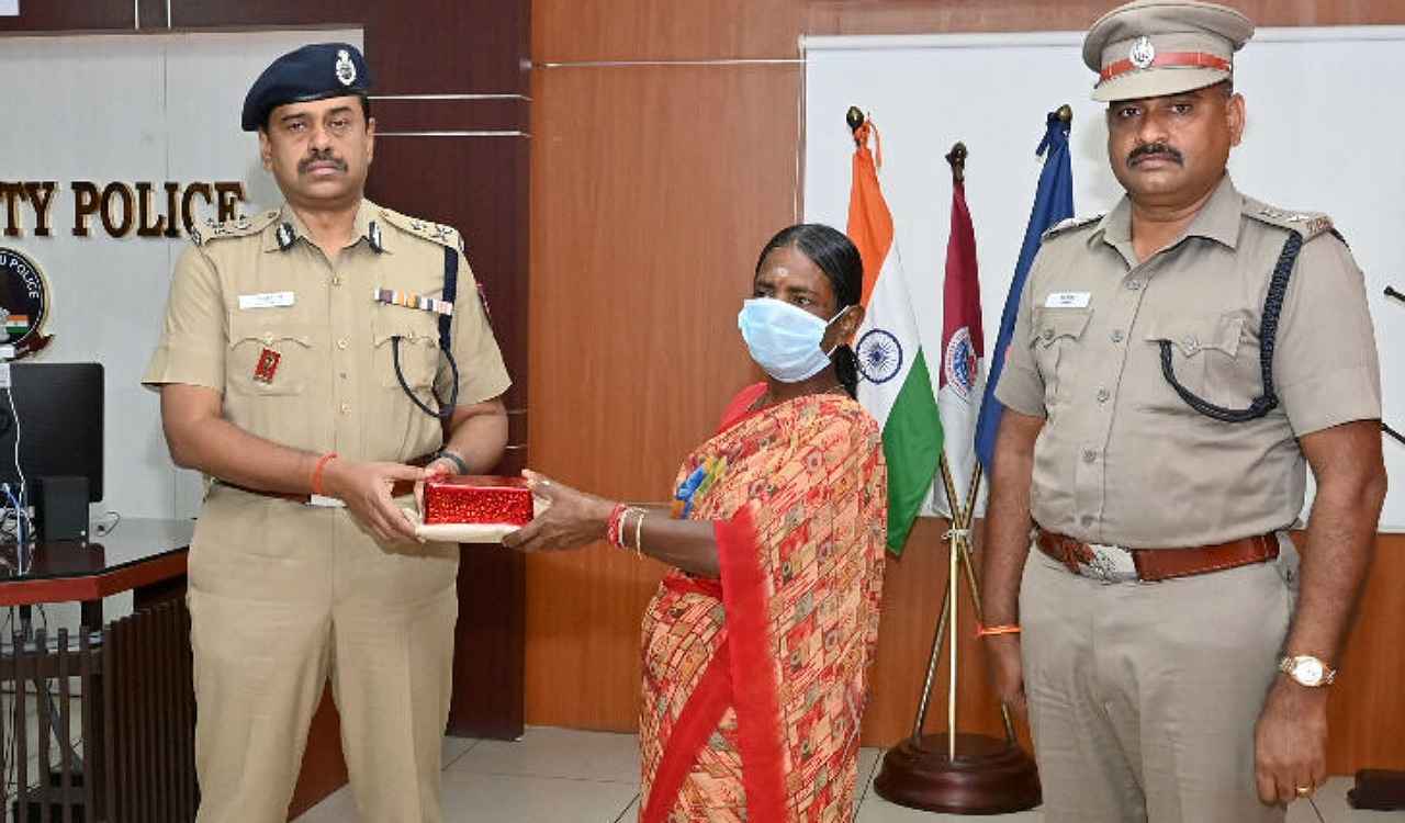 Woman handed over money